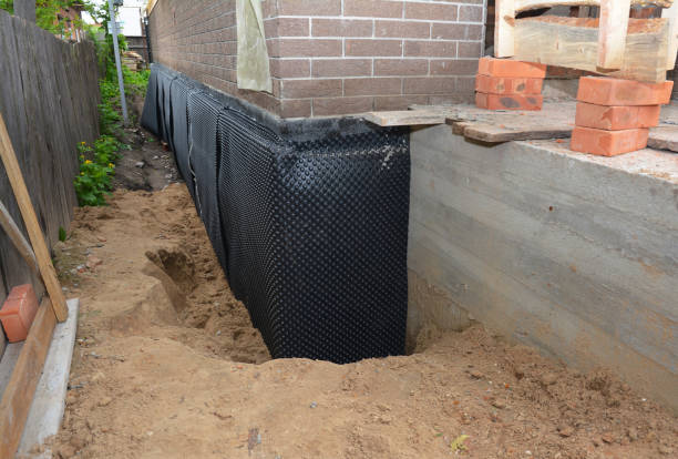 SJ Waterproofing Pros technician performing targeted Exterior Waterproofing assessment in Fairview, GA